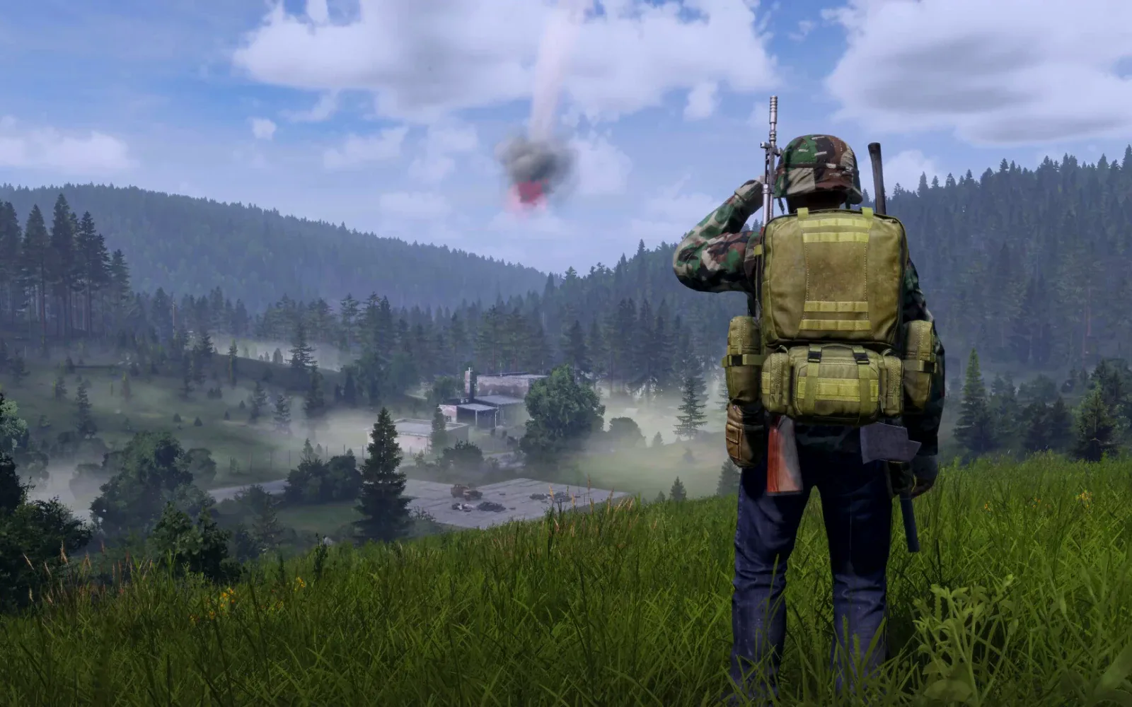 A survivor with a backpack on a hill above the Chernarus forests